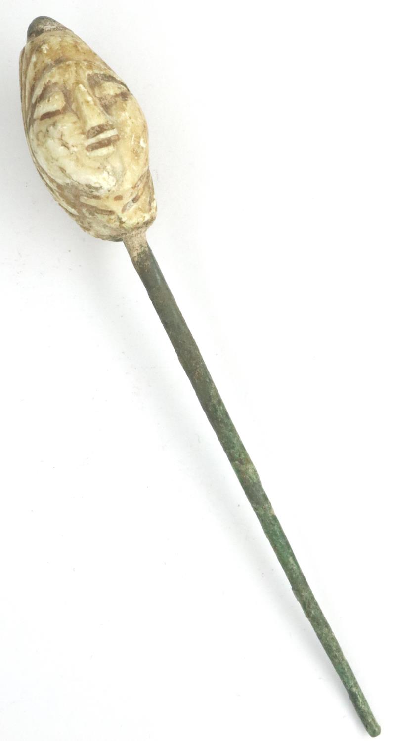 Bronze Age Eastern hair pin with religious deity, L: 120 mm. P&P Group 0 (£5+VAT for the first lot