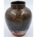 A late Tang Dynasty glazed jar, H: 18 cm. Glaze stops 4 cm short of the base. P&P Group 2 (£18+VAT