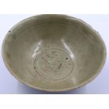 A Song Dynasty celadon glazed bowl, with incised patination to its underside, D: 15 cm, H: 6 cm.