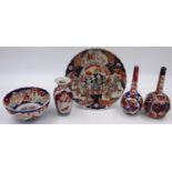 A group of five 19th century Japanese Imari decorated ceramics, including bottle vases, bowl and