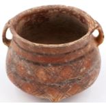 A Neolithic period terracotta pot, with flared rim and two loop handles; the upper body painted with