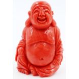 A 19th century carved red coral figure of Budai, H: 5 cm, no visible damages. P&P Group 1 (£14+VAT