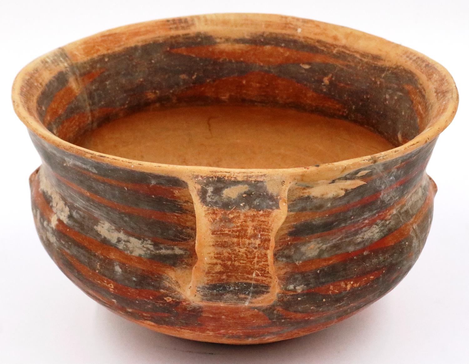 A Neolithic period terracotta bowl, having twin ring handles and flared rim, retaining most of its - Image 4 of 6