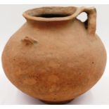 A Han Dynasty terracotta vessel, large, with a double stem handle, D: 30 cm, H: 29 cm. Small