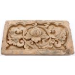 A Song Dynasty grey clay tile, decorated in high relief with a lotus flower, 19 x 36 cm. P&P Group 3