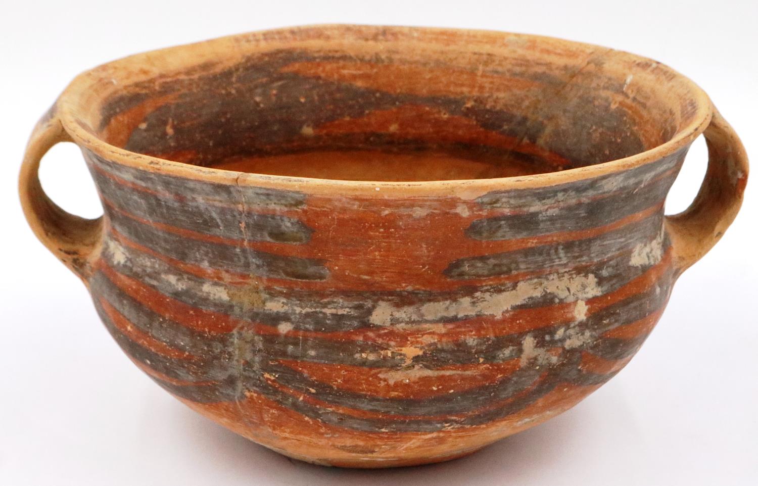 A Neolithic period terracotta bowl, having twin ring handles and flared rim, retaining most of its - Image 3 of 6