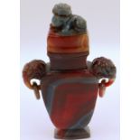 A large and important carved agate flask, covered, having Fo-dog and ring handles and a carved