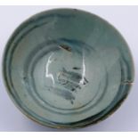 A Ming Dynasty bowl, glazed with blue painted decoration, D: 12 cm, H: 5 cm. Small chips to rim