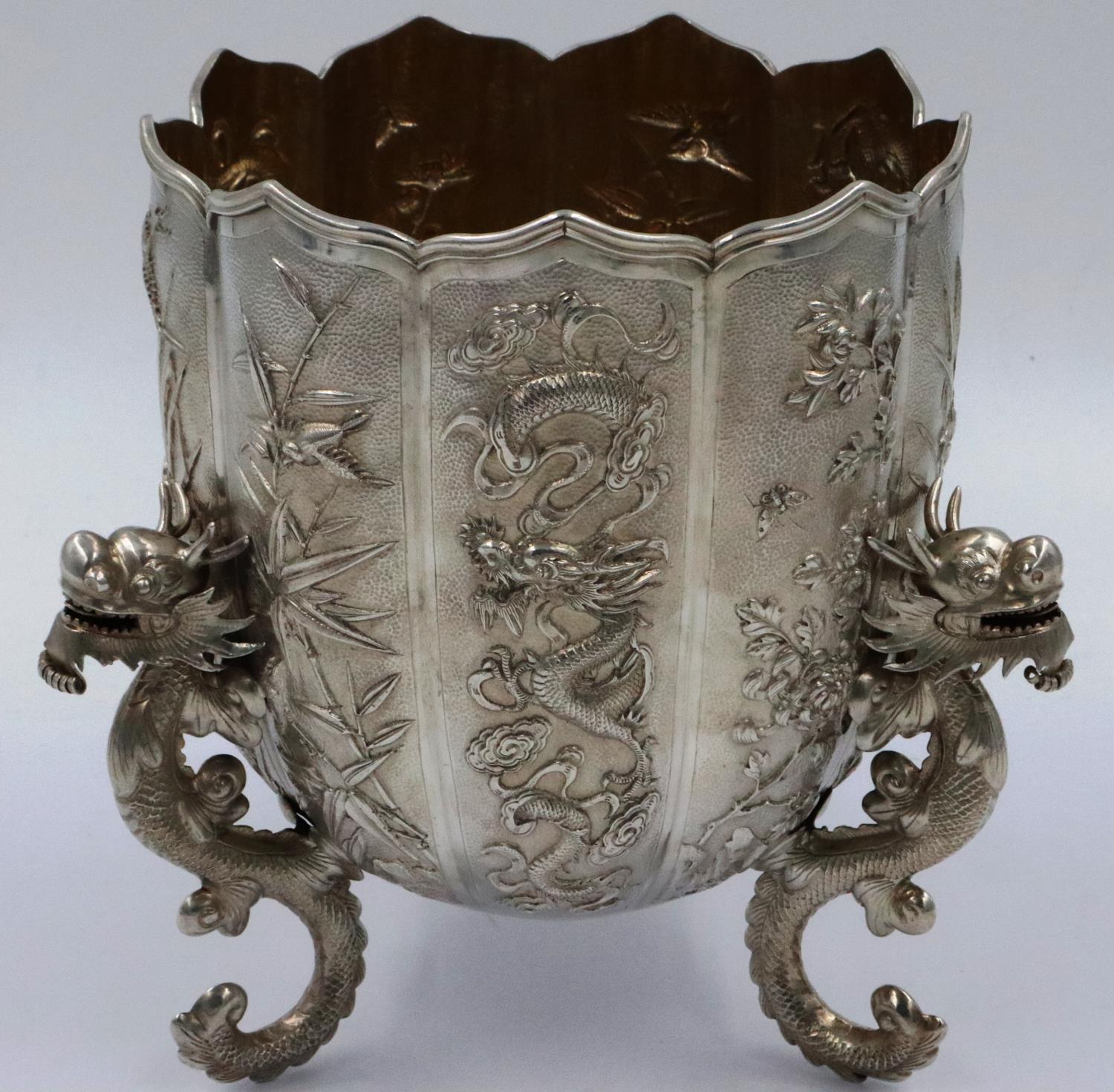 An excellent late 19th century Wang Hing silver presentation bowl, of lotus form with wave-edge rim,