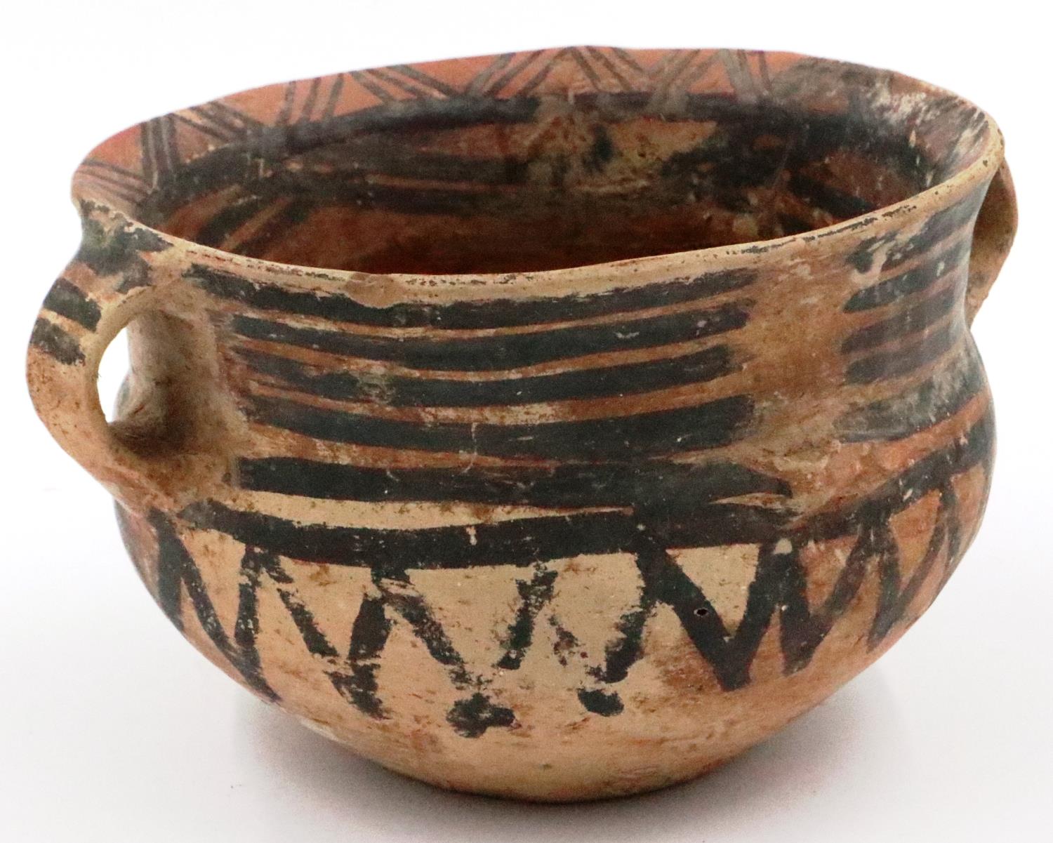 A Neolithic period painted terracotta twin handled pot, decorated with geometric designs, repaired - Image 2 of 9