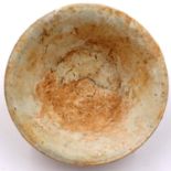 Song Dynasty unglazed bowl, D: 11 cm, H: 4 cm. P&P Group 2 (£18+VAT for the first lot and £3+VAT for
