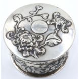 Good quality Chinese Export silver dressing table box of circular form with all over Chrysanthemum