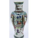 A Kanxi period? famille vert porcelain vase, decorated with a multitude of figures, including a