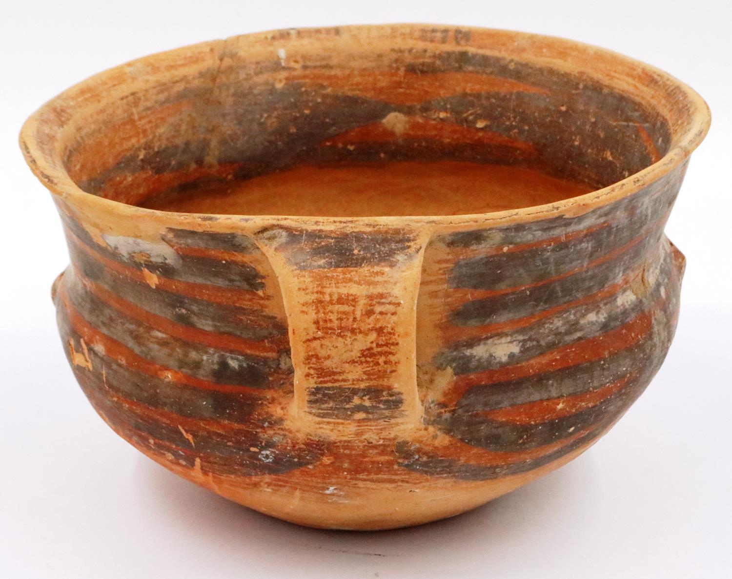 A Neolithic period terracotta bowl, having twin ring handles and flared rim, retaining most of its - Image 2 of 6