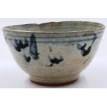 A Ming Dynasty bowl, glazed with blue painted decoration, D: 10 cm, H: 6 cm. Small chips to rim