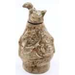 An early covered jar or bottle, of inverted-baluster form, the body polychrome decorated and