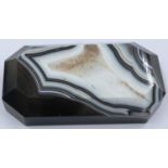 A polished manao banded and laced brown agate block with bevelled edges, 10 x 5 x 2 cm H. P&P