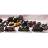 Three OO scale locomotives, ten wagon four wheel coach, plus track, controllers etc. Mostly in