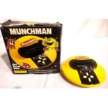 Grandstand Munchman boxed handheld game. P&P Group 1 (£14+VAT for the first lot and £1+VAT for