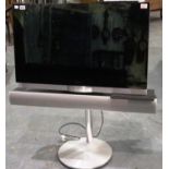 Bang & Olufsen Beovision 7-32 television on motorised floor stand and Beo 4 remote. All electrical