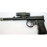 GAT pistol with laser spotter and a tin of pellets. P&P Group 2 (£18+VAT for the first lot and £3+