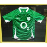 Framed IRFU green Puma shirt, O2, signed by the 2010 team, 103 x 89 cm. P&P Group 1 (£14+VAT for the