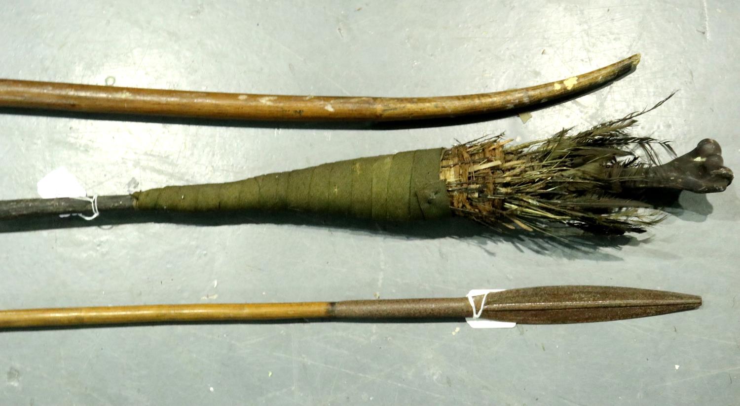 Three South African Tribal spears, one with feathered tail, largest L: 227 cm. Not available for