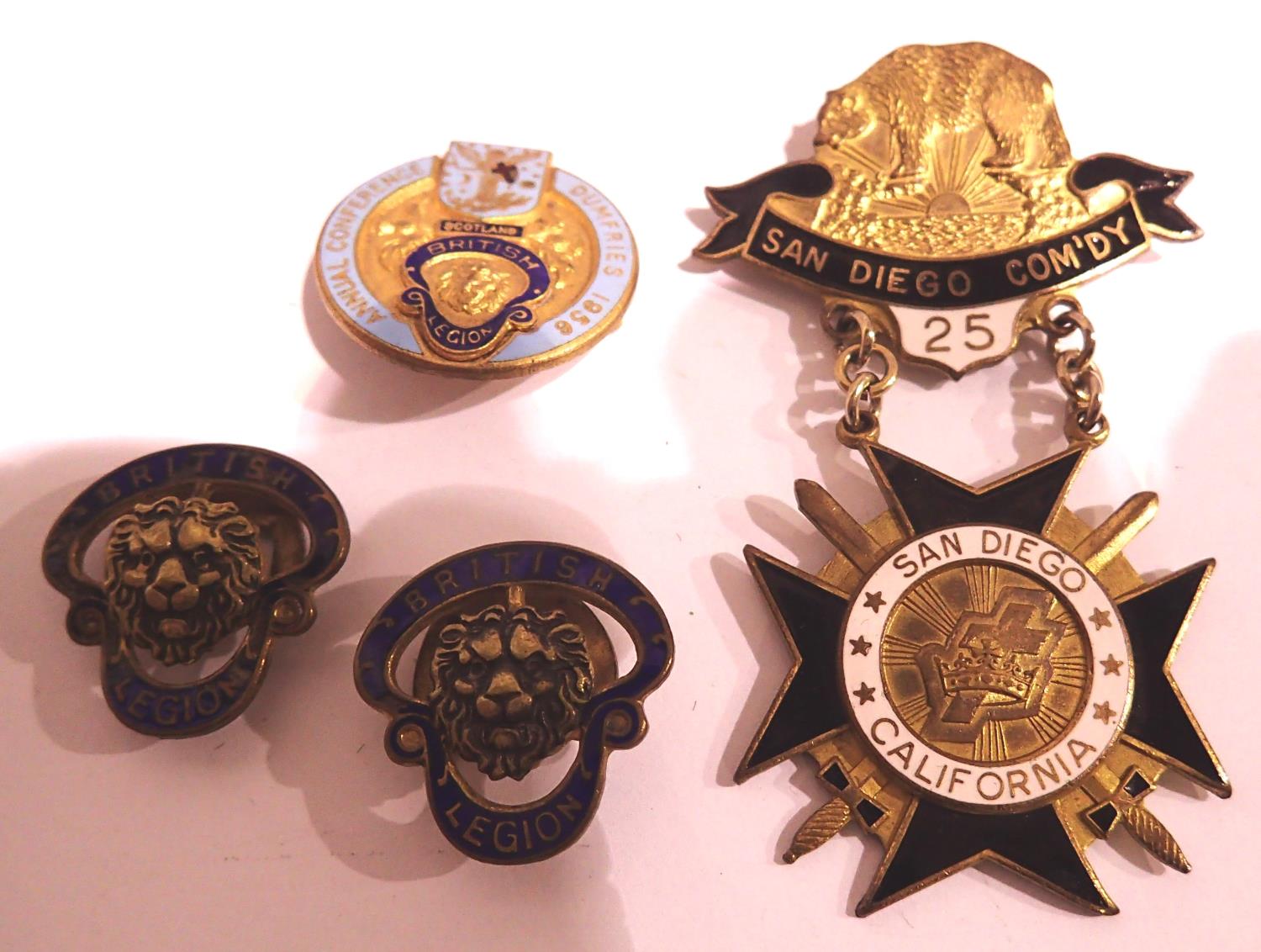 Three enamelled British Legion lapel badges, with a Californian fraternity badge (4). P&P Group