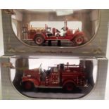 Two signature models 1/43 scale fire engines 1928 Studebaker fire truck and 1941 G.M.C fire truck,