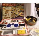 Meccano airport services set, contents very good, few parts missing, box is fair. Plus build