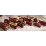 Twelve assorted fire engines to include Dinky, Corgi, Matchbox, some re-finished, mostly in good