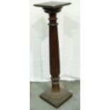 A Victorian mahogany torchere, with fluted column and square base, 30 x 30 x 118 cm H. Not available