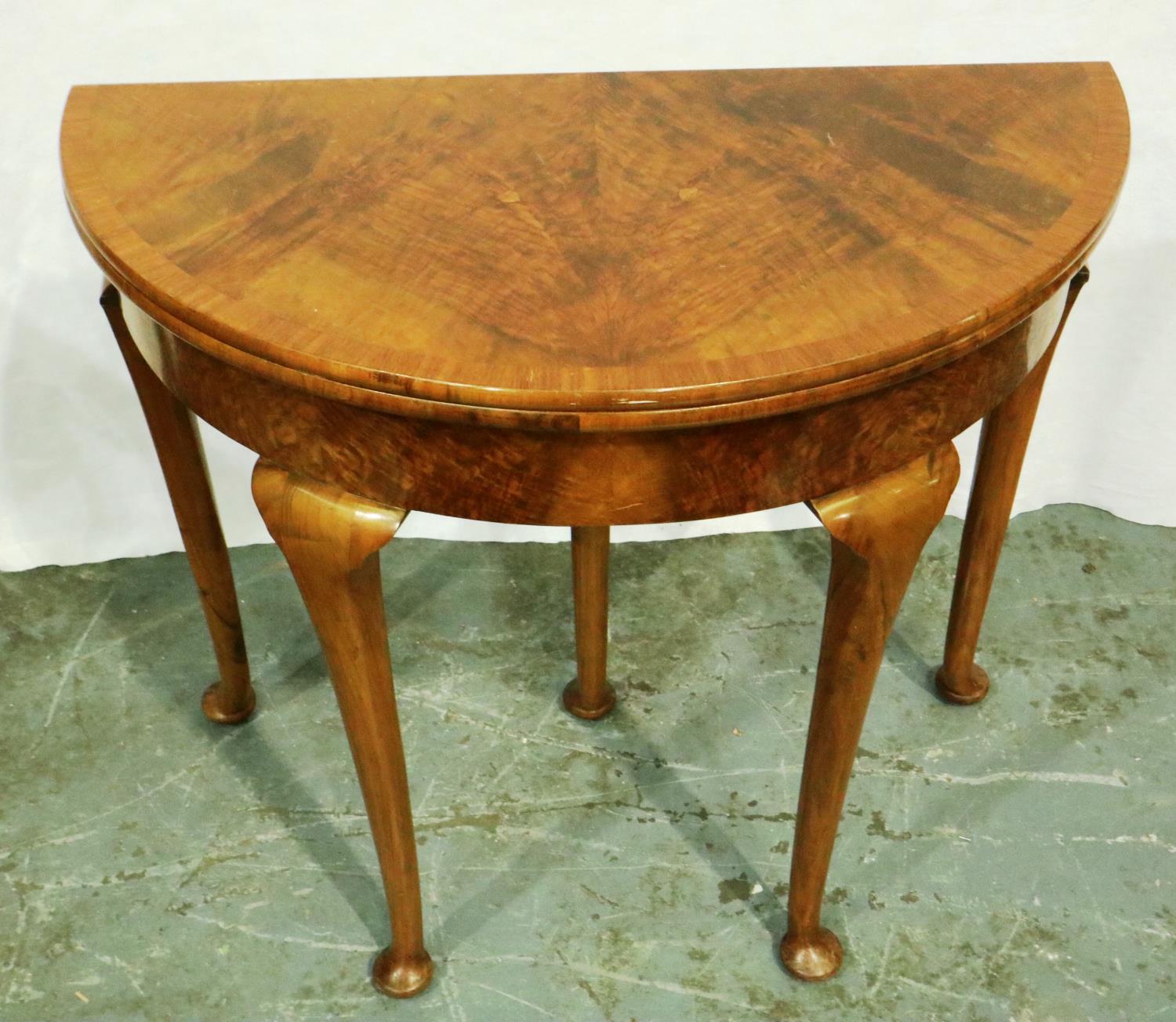 An early 20th century walnut demi-lune games table with fold over top and cabriole supports, D: 84 - Image 4 of 4