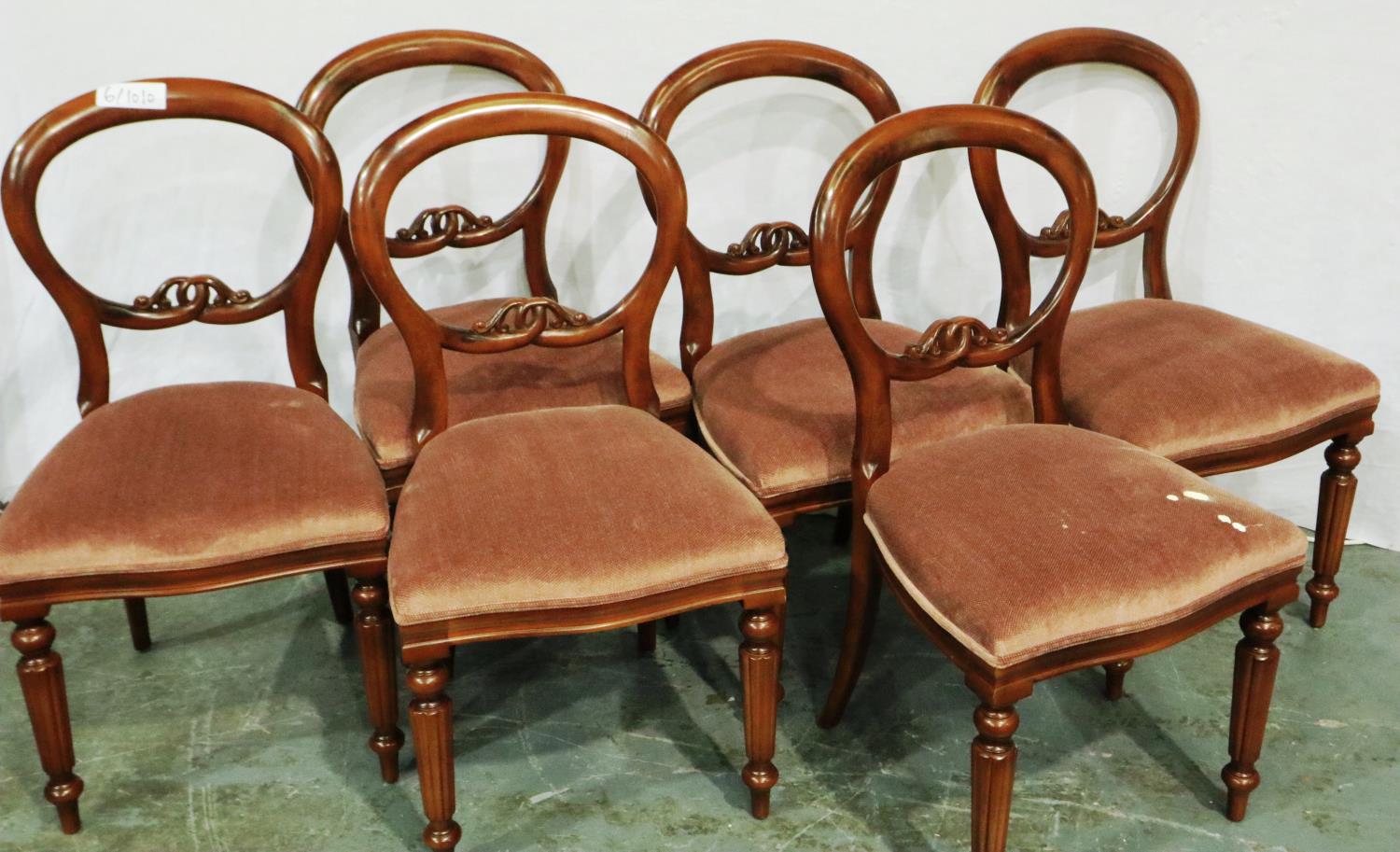A set of six Victorian style balloon back dining chairs, each with upholstered seat. Not available