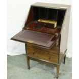 An Edwardian inlaid mahogany fall front bureau of diminutive proportions, with fitted interior and