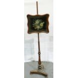 A Regency period rosewood pole screen with a beadwork panel, H: 135 cm, lacking finial. Not