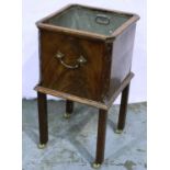 An early 20th century mahogany cooler raised on four supports with brass castors with lead liner, 29