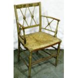 A Continental early 20th century elm chair with rush seat, stripped and printed, some old woodworm