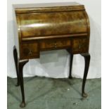 An early 20th century burr walnut Bonheur du jour with cylinder front and fitted interior, 70 x 44 x