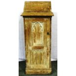 An ecclesiastical whitewashed pine lectern, with adjustable bookstand and cupboard below, 54 x 37