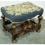 A 19th century walnut framed stool in the Carolean manner, with woolwork upholstered top, 53 x 40