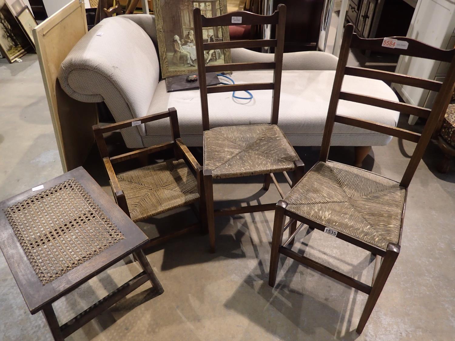 A pair of rush seated bedroom chairs, a childs rush seated chair and a canework stool (4). Not