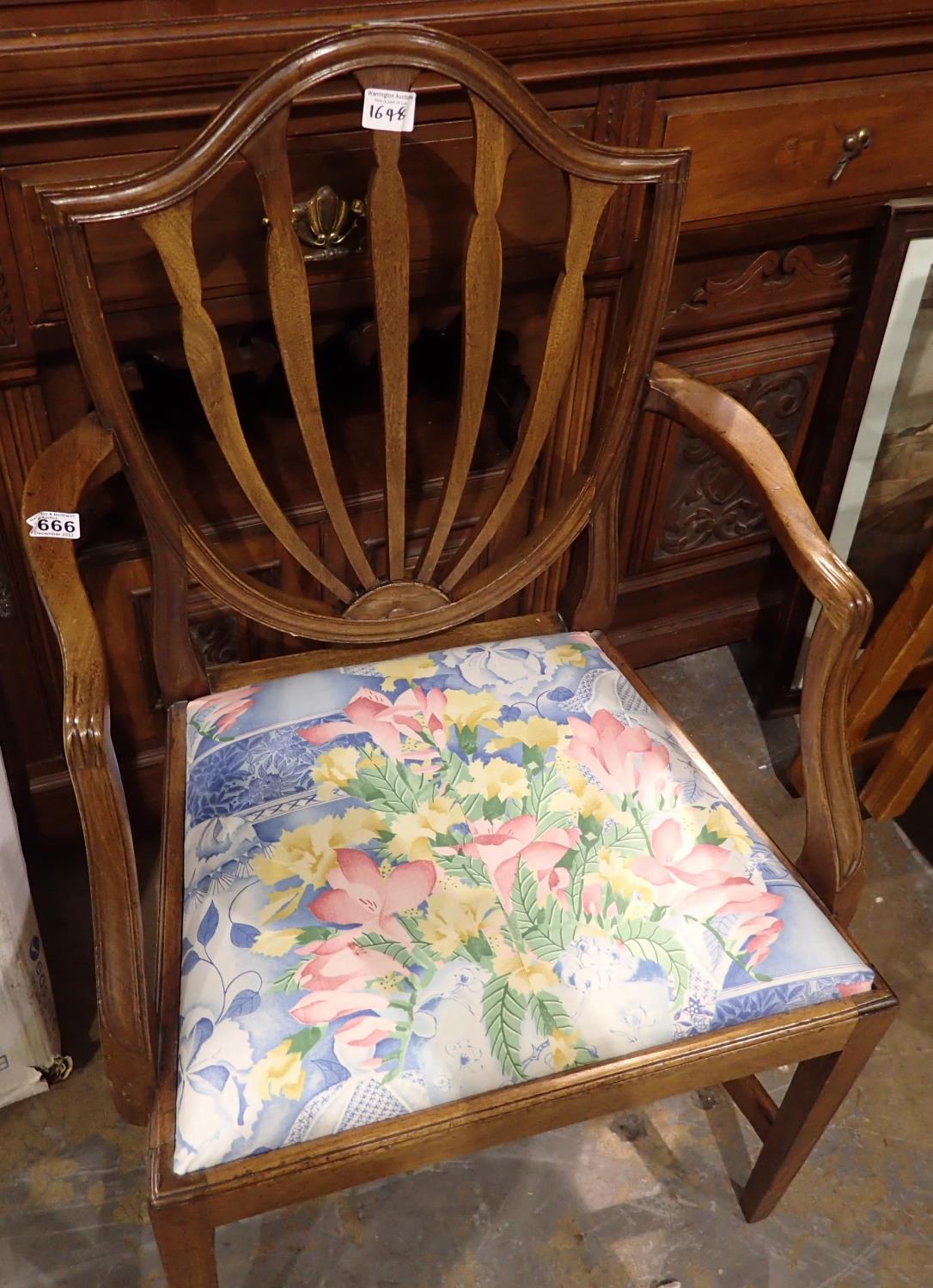 19th Century mahogany framed shield back elbow chair with drop in seat. Not available for in-house