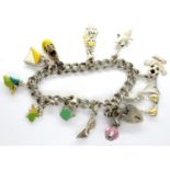 Silver charm bracelet with hallmarked silver padlock clasp and eleven charms, L: 20 cm, 36g. P&P