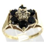 9ct gold flower ring set with sapphires and a central diamond, size L, 1.8g. P&P Group 1 (£14+VAT