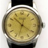 Baume: vintage automatic wristwatch on a black leather strap, working at lotting. P&P Group 1 (£14+