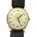 Bernex: gents 9ct gold wristwatch on a leather strap, working at lotting. P&P Group 1 (£14+VAT for