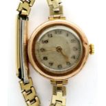 Ladies 9ct rose gold wristwatch on a gold plated bracelet, not working at lotting. P&P Group 1 (£