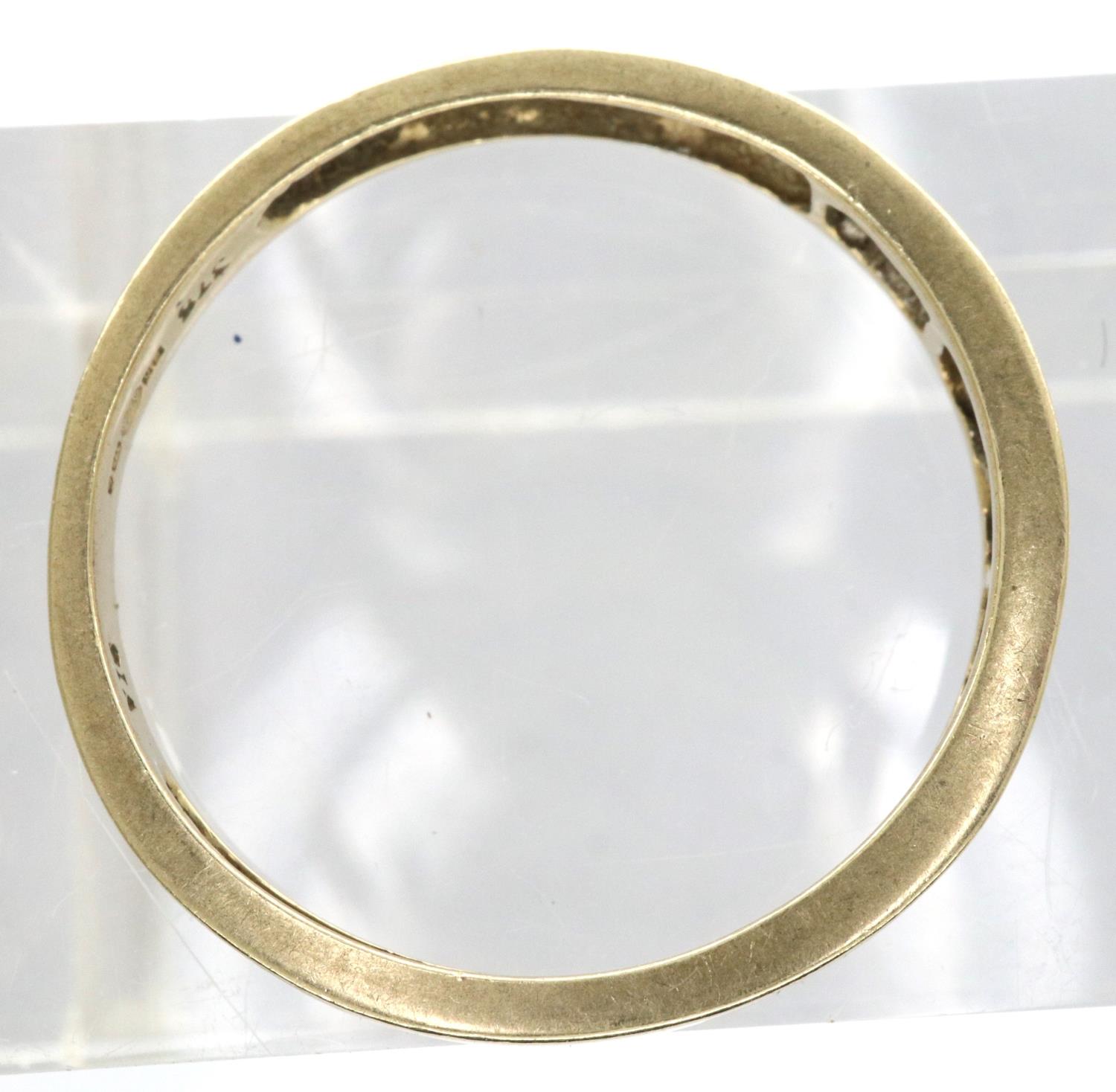 9ct gold band set with nine graduating diamonds, size N/O, 1.3g. P&P Group 1 (£14+VAT for the - Image 2 of 3