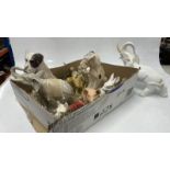 PORCELAIN ANIMAL ORNAMENTS; PLASTER TERRIER FIGURES